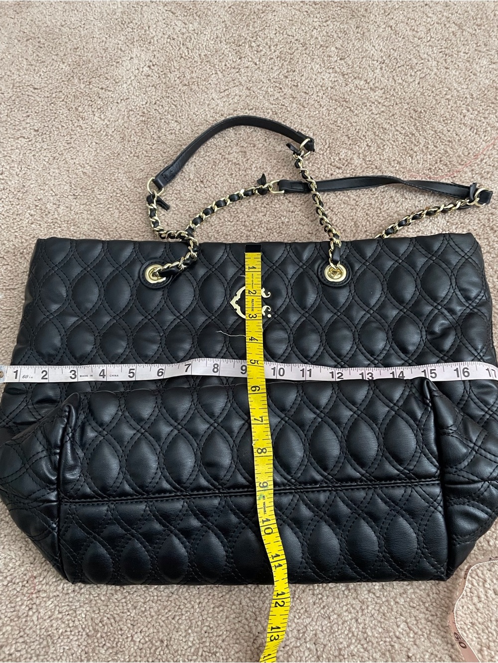 C. Wonder Quilted Black Tote with Gold Chain Handles